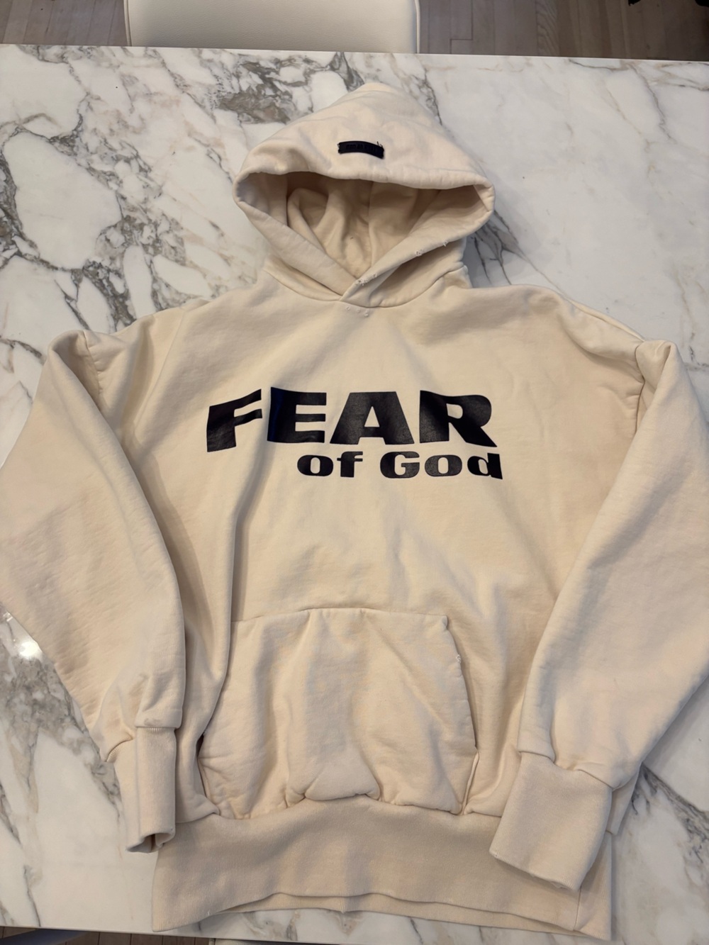Fear of God Kids Cream Pullover Hoodie with Black Logo